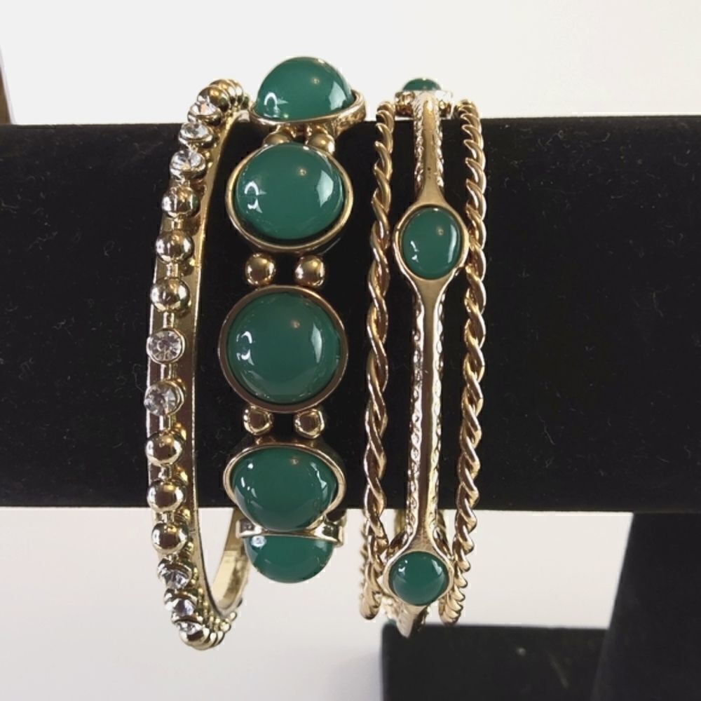 Fashion jewelry five piece faux emerald and gold tone bracelet set